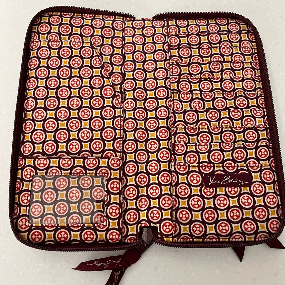 Vera Bradley wallet. Zip outer compartment and slide in compartment.